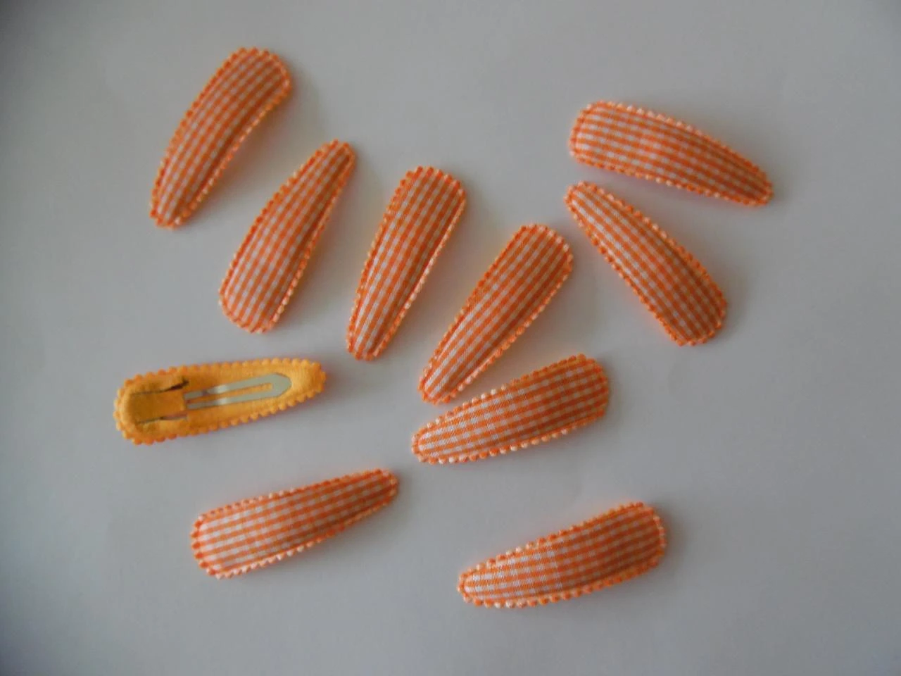 Partij 10 haarspeldjes 5 cm oranje geruit